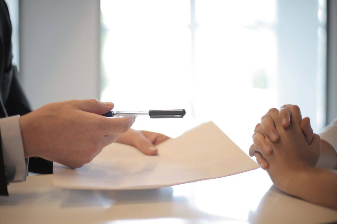 Professional salary negotiation discussion in an office meeting