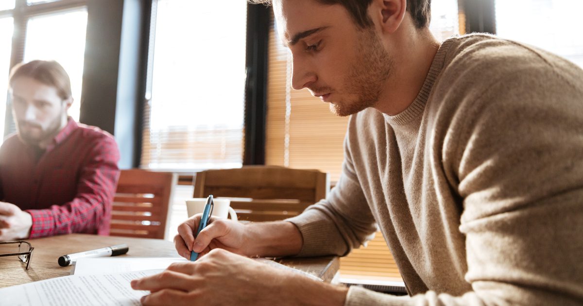 How to write a job brief while taking notes at an office desk